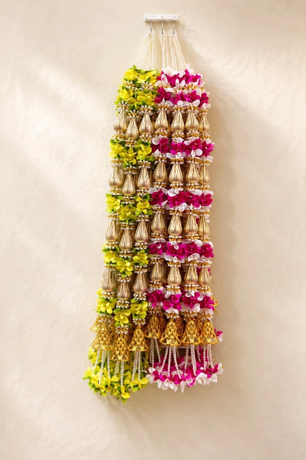 Yellow and pink floral Diwali bandarwal with gold beads and bells