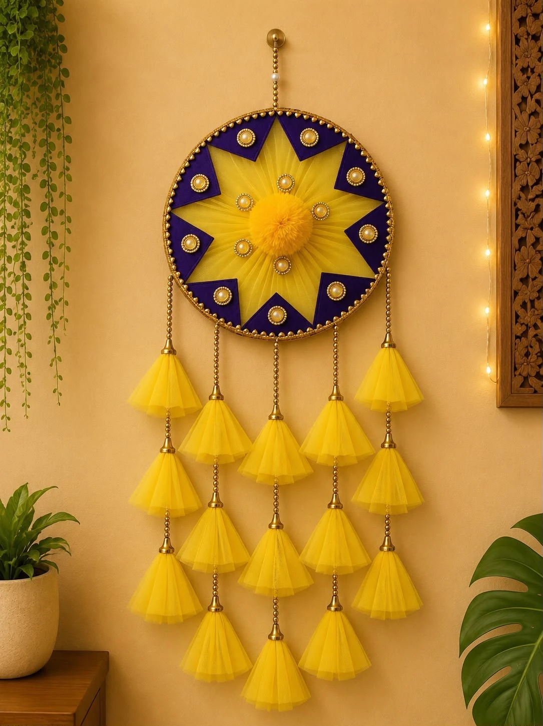 Yellow and purple star mandala Diwali wall hanging with pearl embellishments and layered yellow net tassels